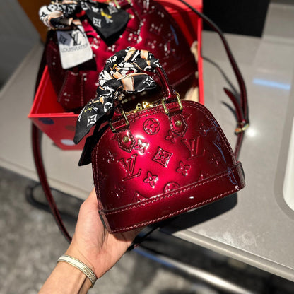Embossed bright leather Alma shell bag 1824041702
